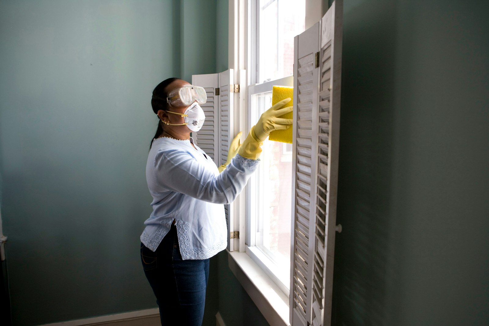 Professional cleaner tidying up a Modesto kitchen during house cleaning service